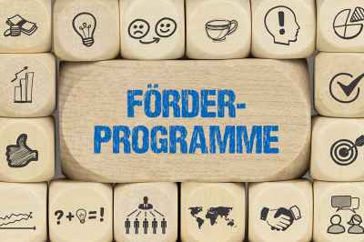 © magele-picture - stock.adobe.com Schriftzug Förderprogramm